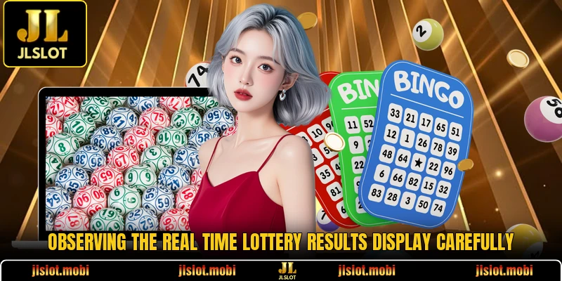 Observing the real time lottery results display carefully